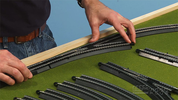 Family Train Layout laying and wiring track