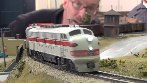 David Popp looking at an N scale locomotive