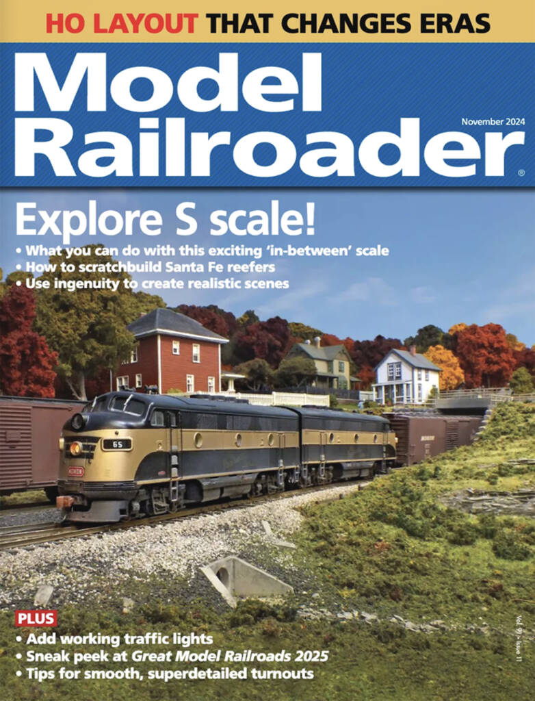 The November cover of Model Railroader, which features a model locomotive on a model railroad layout with a blue sky background