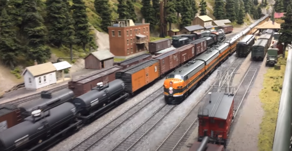 GN's Empire Builder westward through the Cascades and the City of Everett in Western Washington State