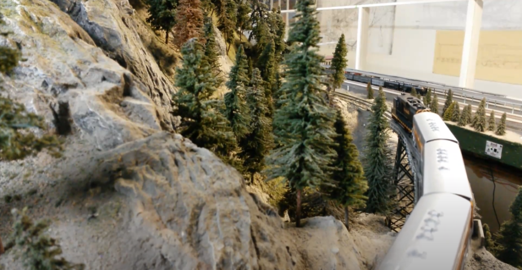 Westbound Denver & Rio Grande Western hauls an equally varied manifest freight over the Golden Spike Train Club of Utah layout