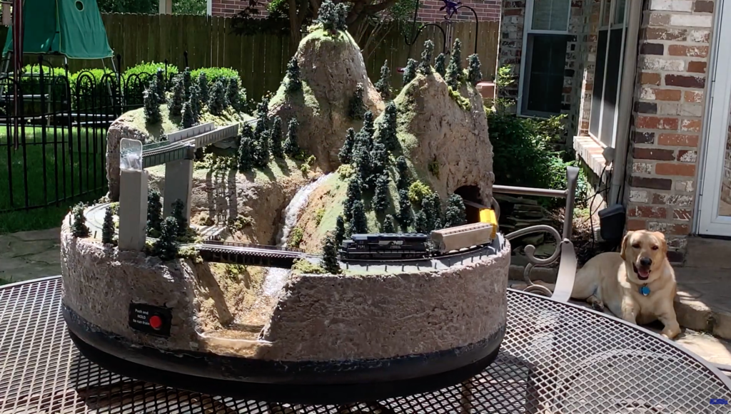 Battery-powered 24" N-scale model railroad with waterfall
