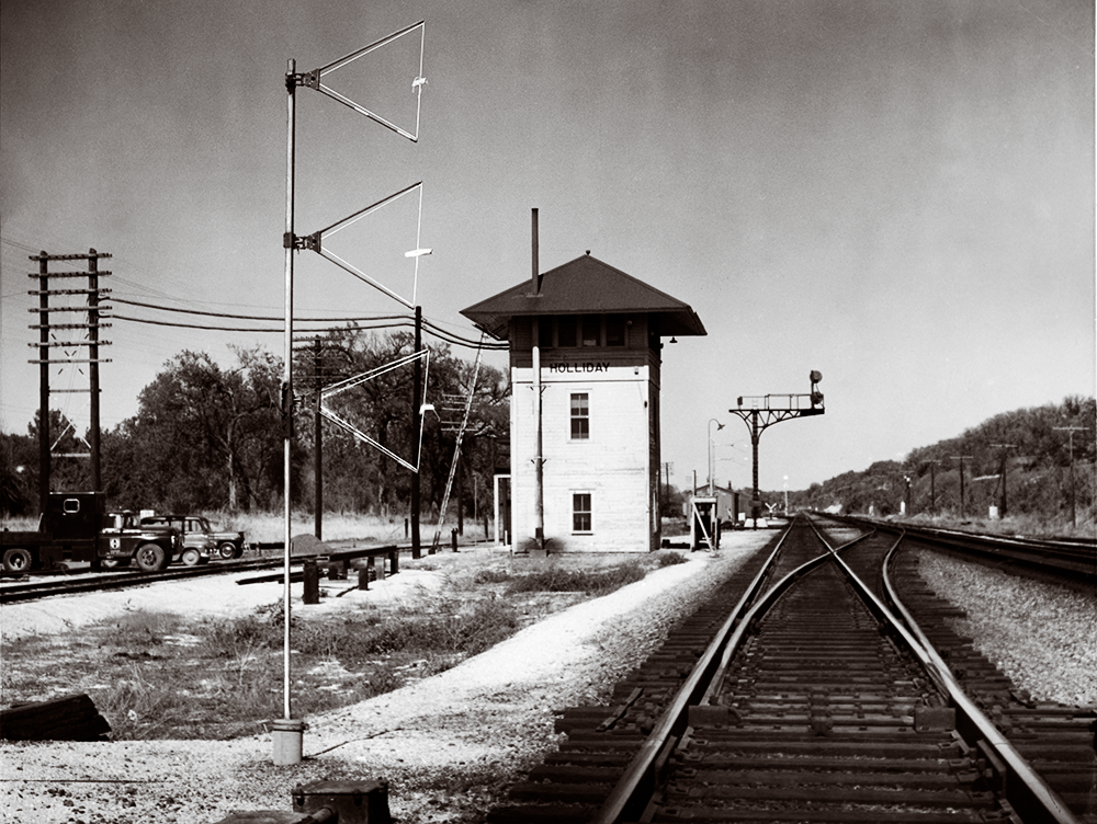 A black and white photo of a train watchtower