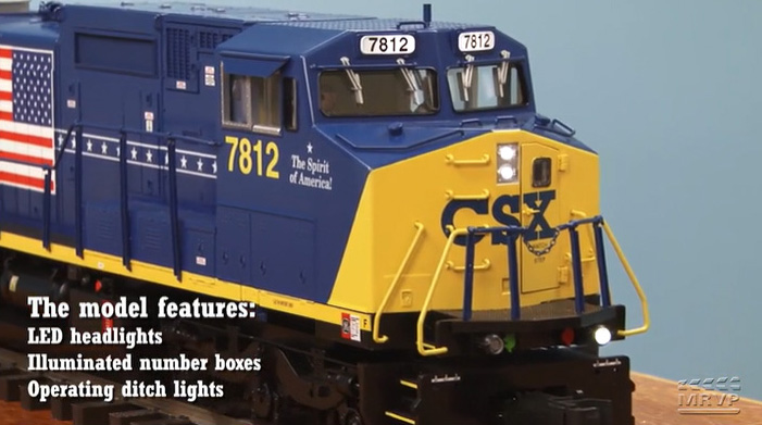 a video screencap showing a close up of a garden scale CSX engine