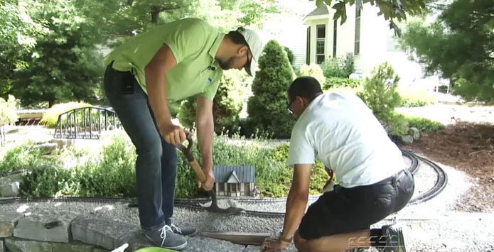 A screenshot of a couple of people working on a garden layout