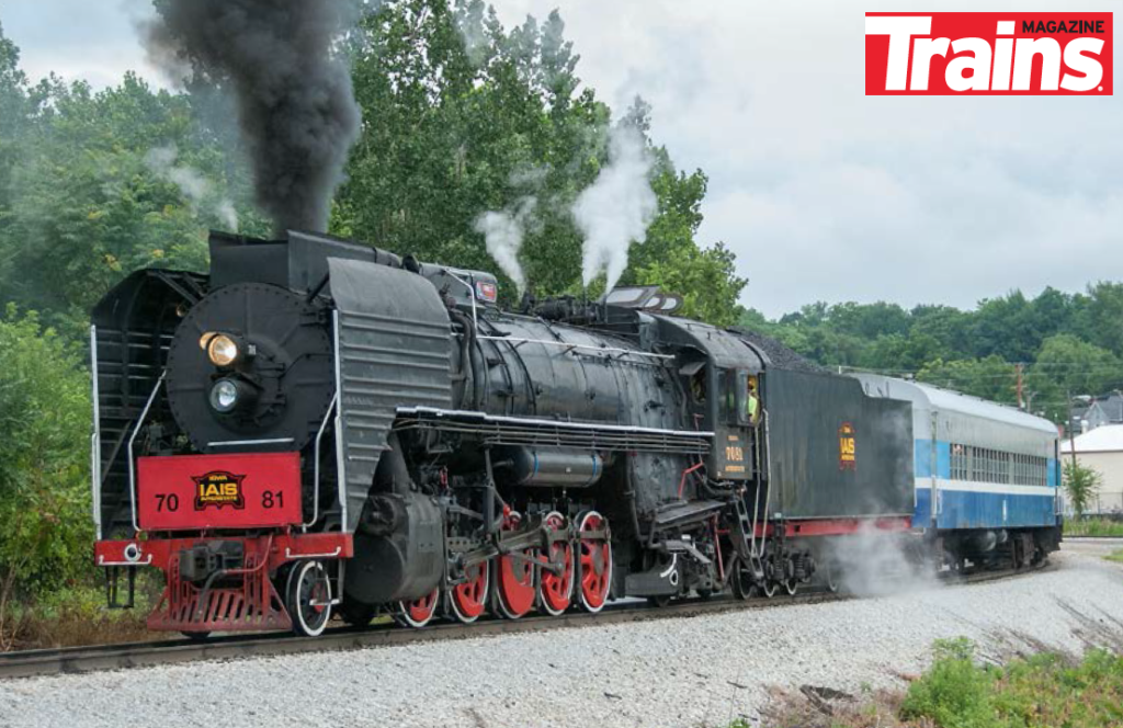 Chinese-built Iowa Interstate Railroad's 2-10-2 Santa Fe type steam locomotive pulls a passenger train at Rock Island, Illinois.