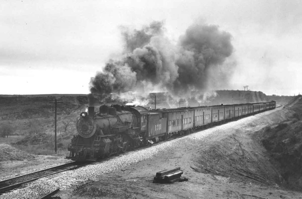 Steam locomotive on passenger train