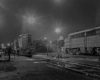 Diesel locomotives in service facility at night