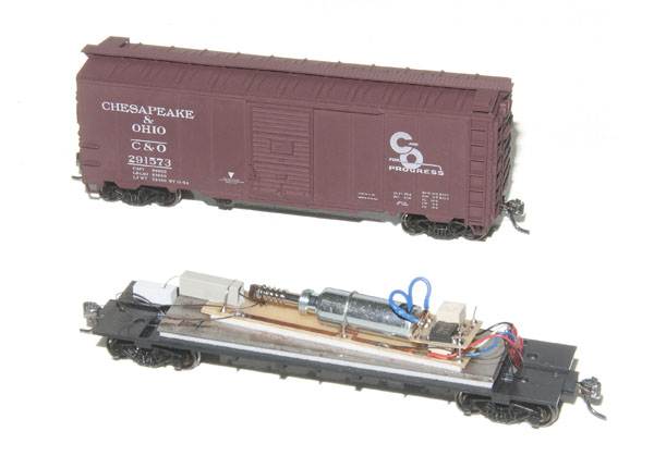 DCCUncoupling.com HO scale 40-foot boxcars with Digital Command Control-operated knuckle couplers