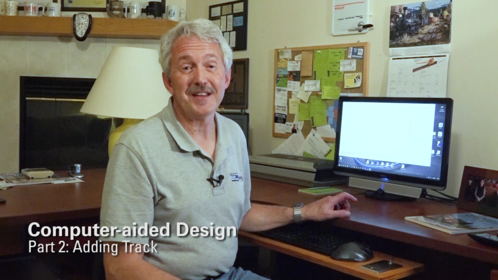 Gerry Leone in front of a computer.