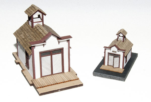 Wild West Scale Model Builders HO scale firehouse. Shown with N scale model