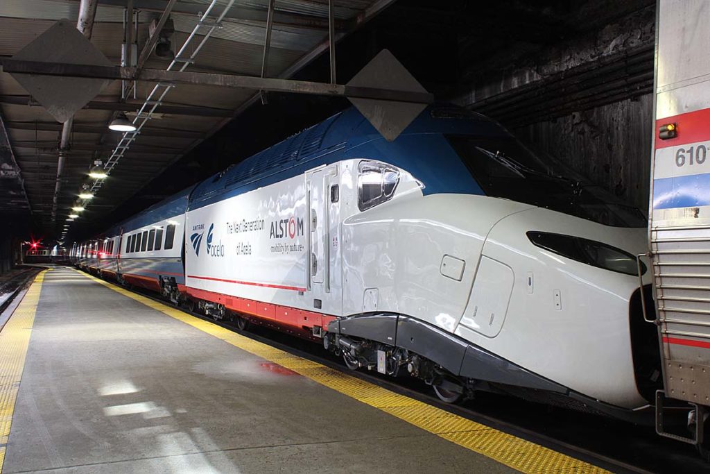 White long nosed high speed train in station