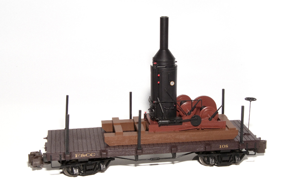 Bachmann 1:20.3-proportion flatcar with steam log skidder