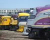 Six trains lined up in a rail yard