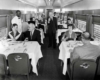 diners seated in a dining car