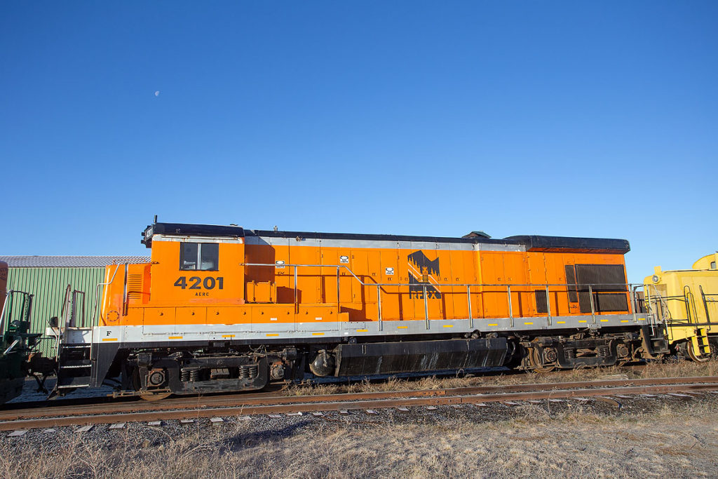 An orange-painted locomotive.