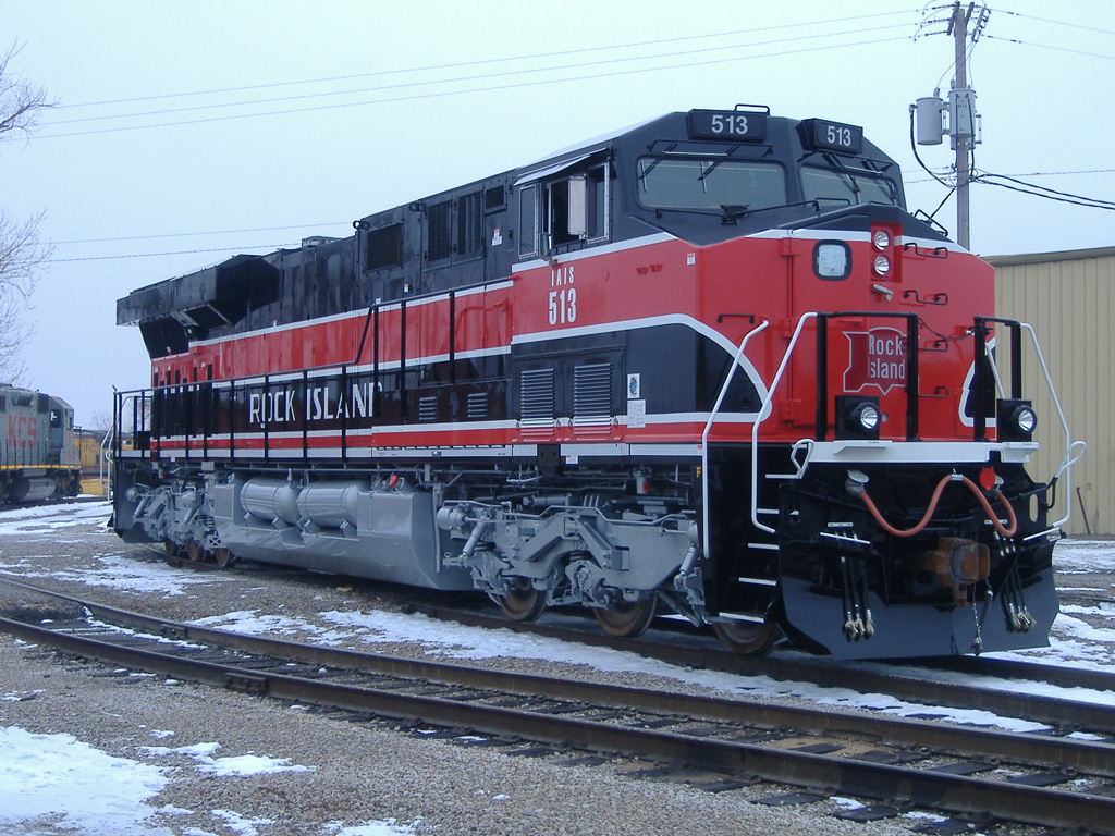 Black, red, and white diesel locomotive