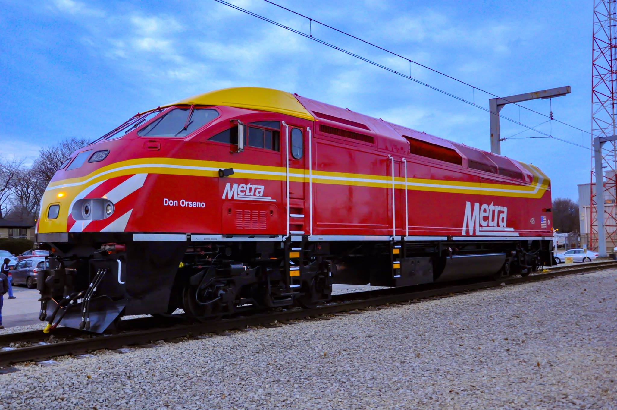 Red-and-yellow streamlined diesel locomotive