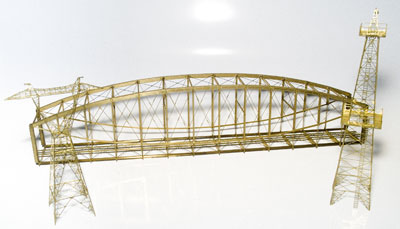 Single-track lenticular pin-connected truss bridge 