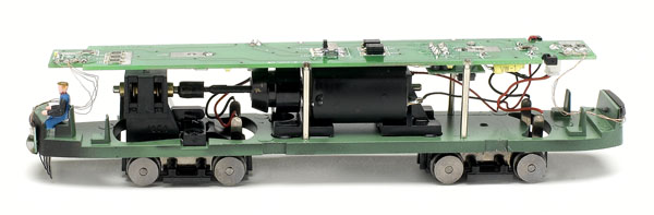 The printed-circuit board is mounted above the can motor and flywheel. A drop-in Digital Command Control decoder is available for the model.