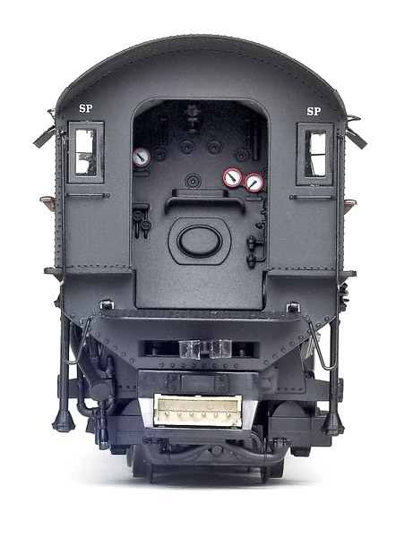 The cab interior has a detailed backhead with painted gauges.