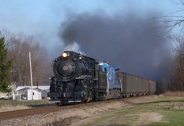 Ohio Central 2-8-0 No. 33 leading freight