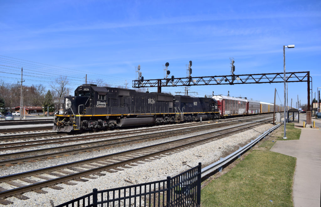 Illinois Central locomotives lead a train at Chicago's Markham Yard.