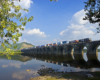 Norfolk Southern stack train traveling over a bridge