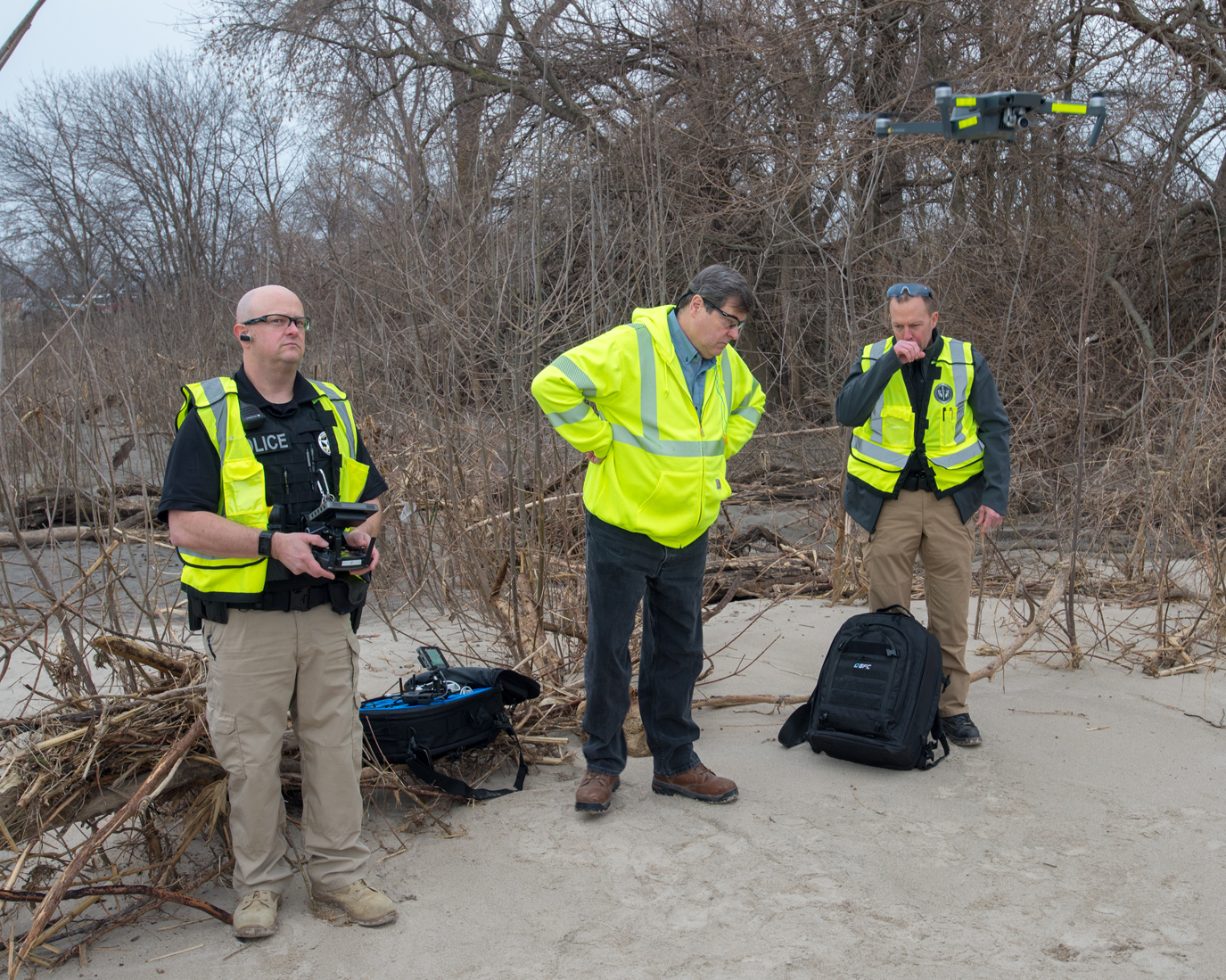 Union Pacific Railroad senior special agent Cayl England left and UP senior manager of public safety Larry Wenko use drones in order to survey and document damage