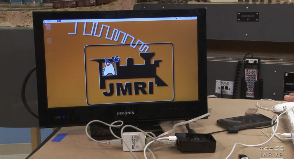 A tv screen with JMRI logo