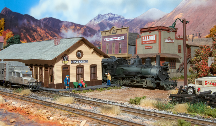 a western town scene on a model railroad