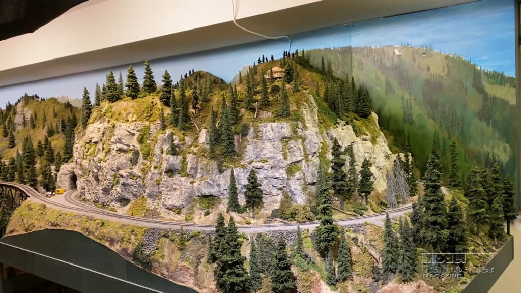 forested mountain scene on a model railroad