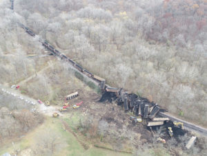 aerial photograph of train cars derailed