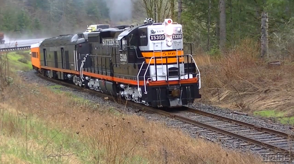 Southern Pacific SD9 No. 5399 pulling a mix of passenger equipment