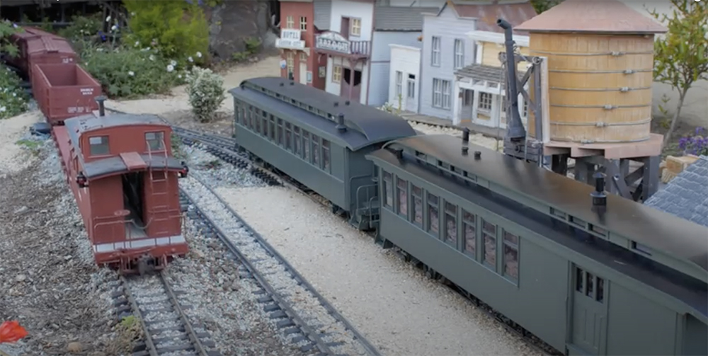 passenger cars on a garden railroad