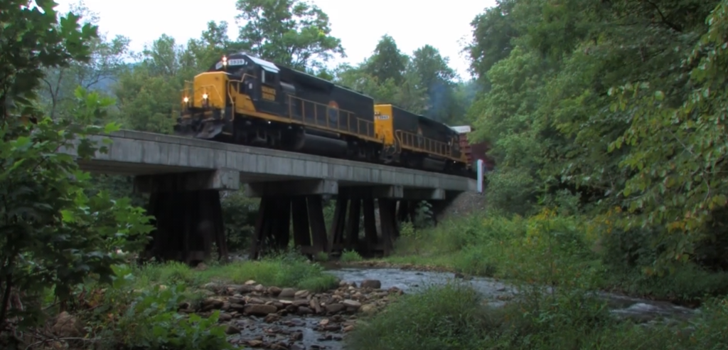 Train traveling over a bridge
