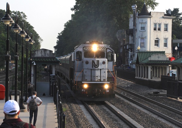 Diesel-powered commuter train approaches station