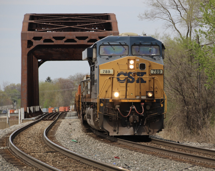 Train crossing truss bridge