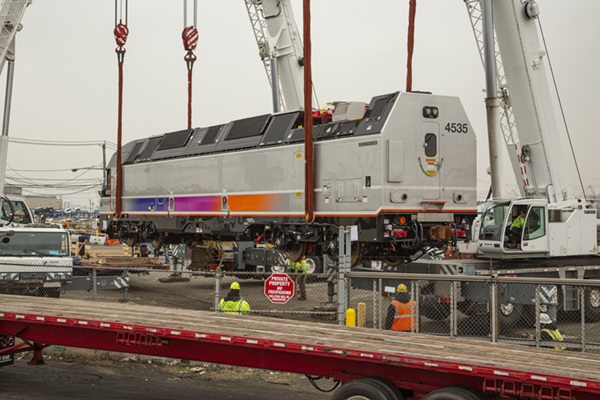 Train being carried off a ship