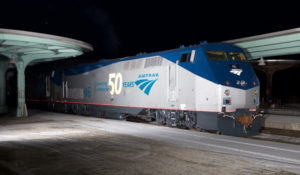 Diesel locomotive in station at night