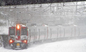 Electric commuter train in snow