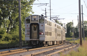 Bilevel, electric passenger rail cars on curve