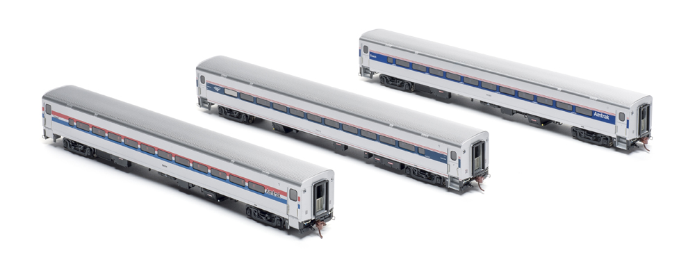 Three Amtrak passenger cars