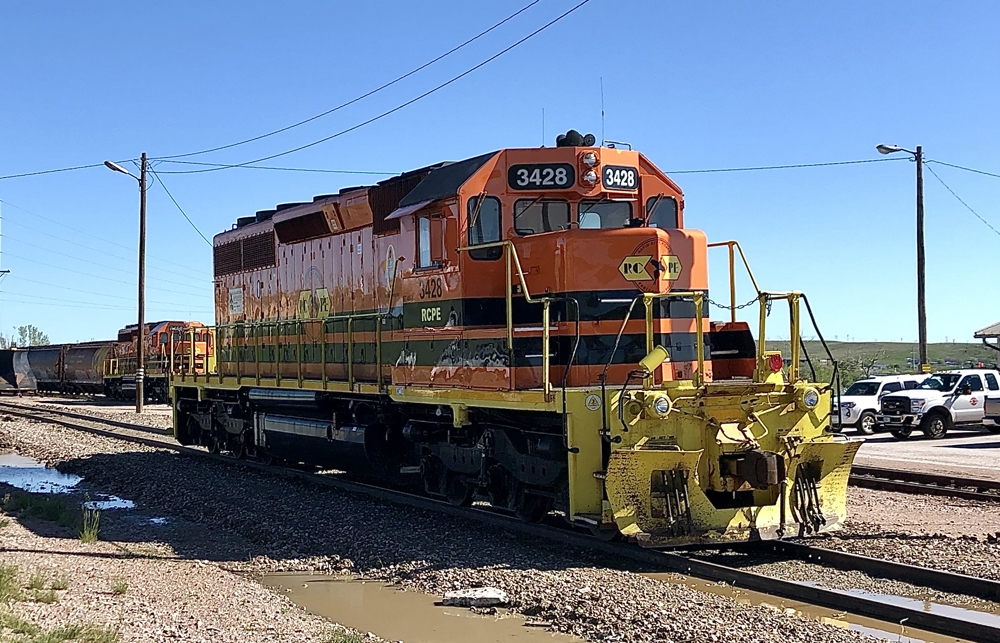 Orange locomotive with black stripes