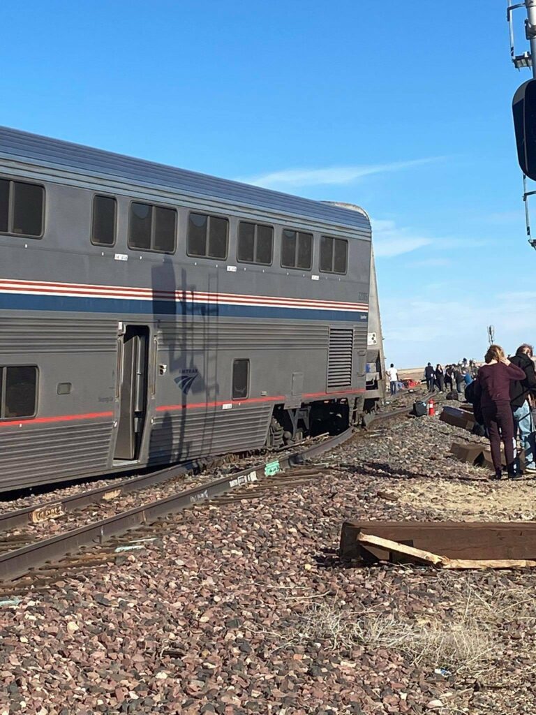 Rail passenger car askew on tracks