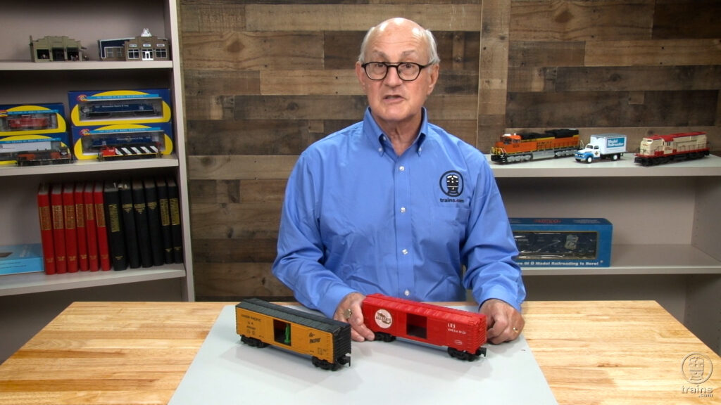 Roger Carp with two Kusan boxcars