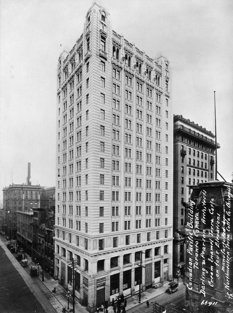 Black and white photo of ornate 15-story building