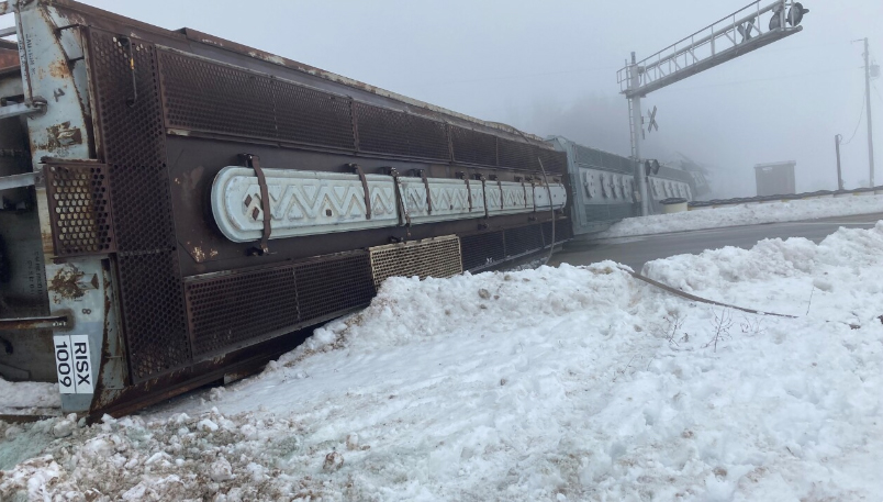 Covered hopper cars on their side