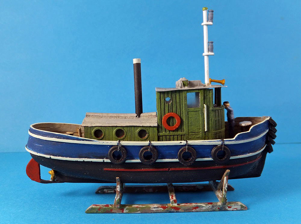 A HO scale mighty little blue tugboat kit.