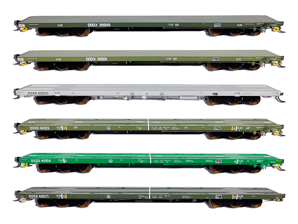 6 different colored 68-foot flatcars in HO scale
